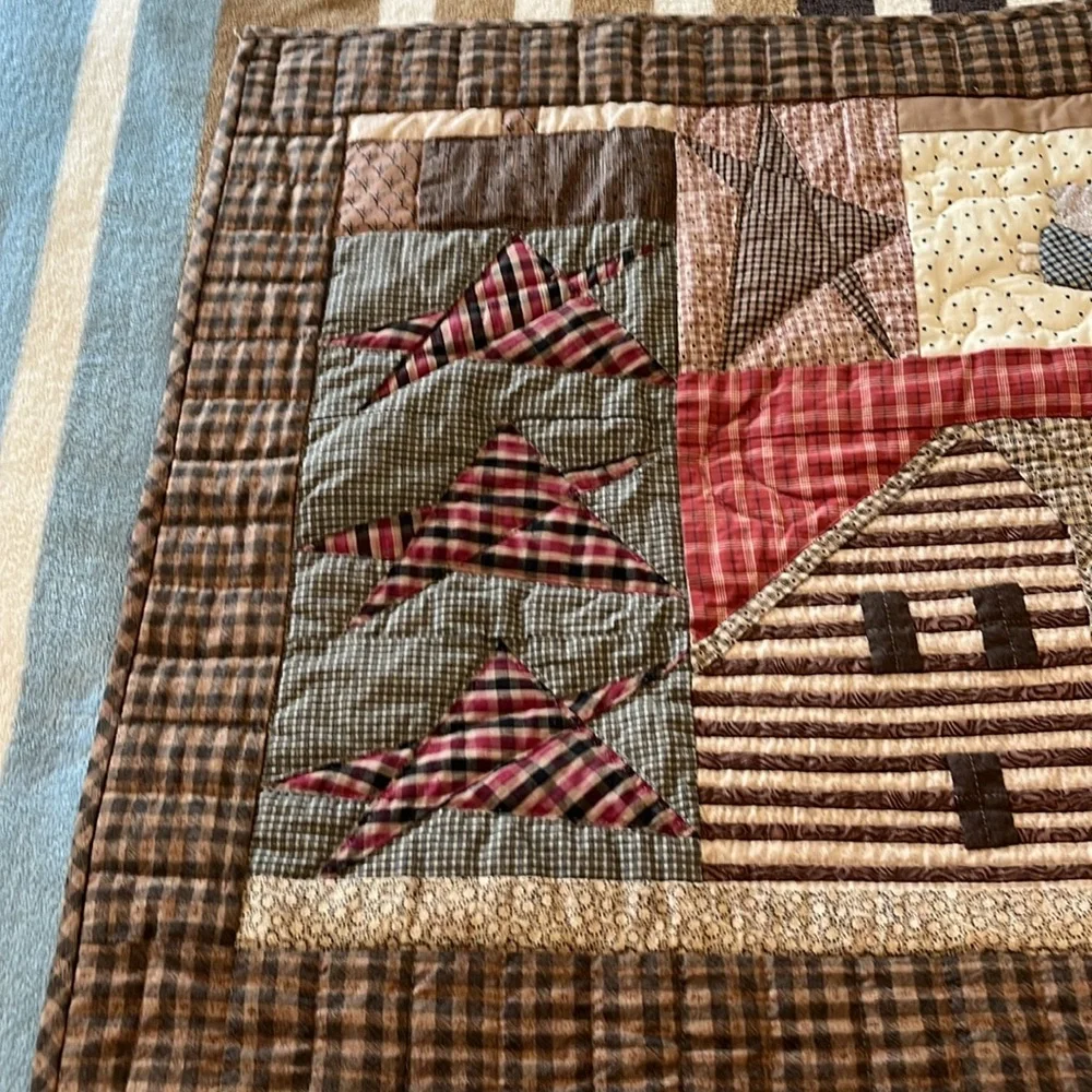 Handmade quilt wall hanging.